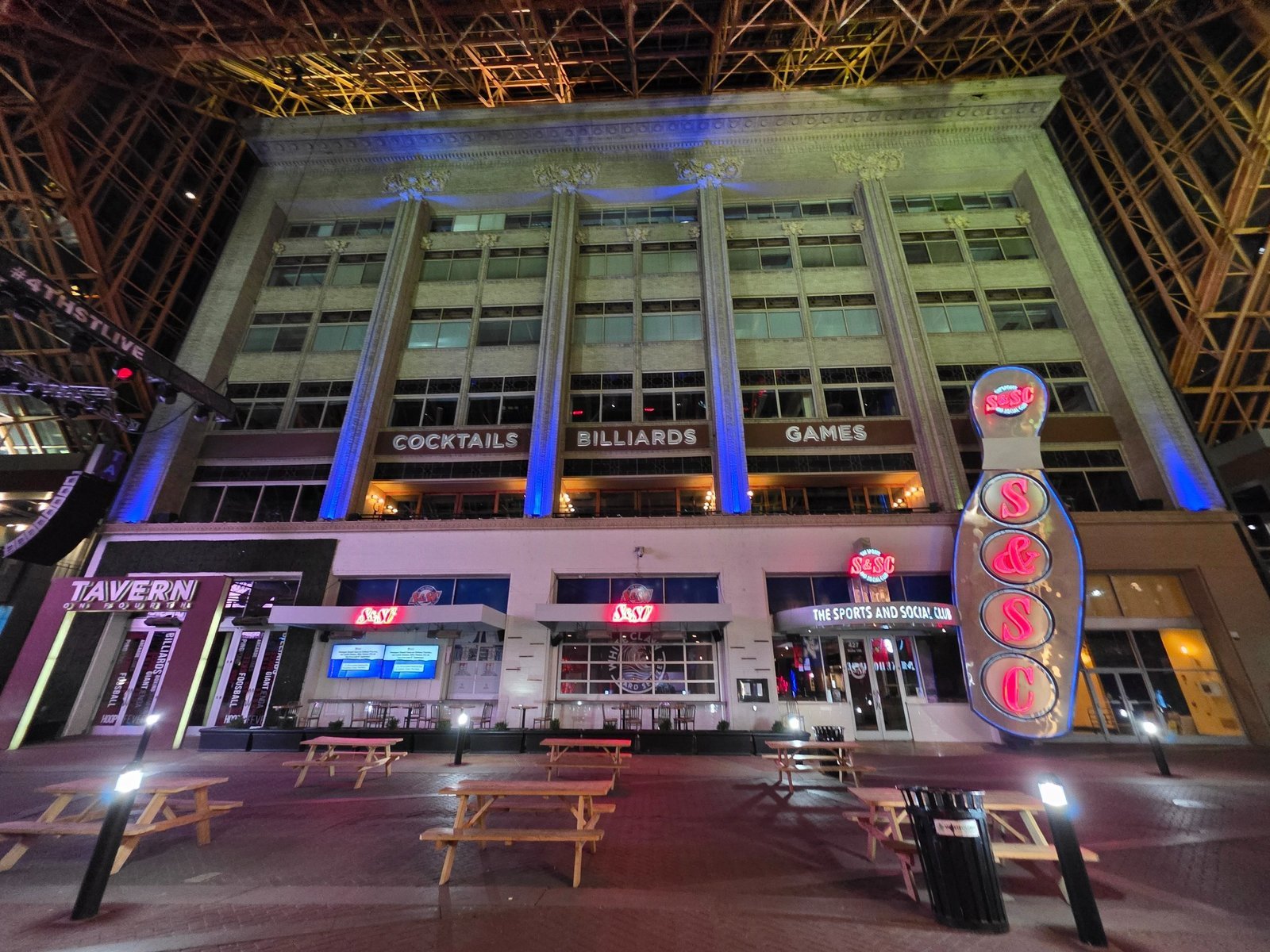 Illuminated city venue after dark